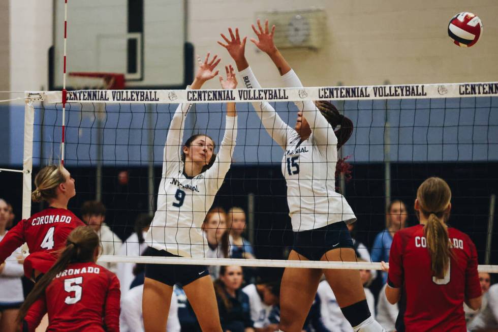 The ball flies past Centennial teammates Mae Stoddard (9) and middle blocker Aliah Williams dur ...