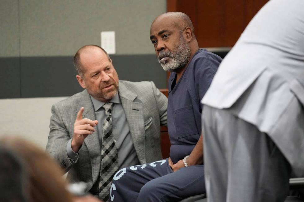 Duane “Keffe D” Davis, right, speaks with attorney Ross Goodman in court Thursday ...