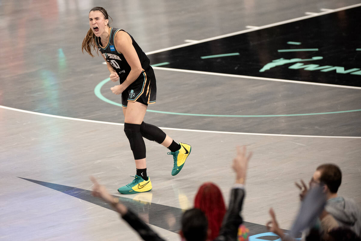 New York Liberty guard Sabrina Ionescu (20) celebrates after scoring during the second half in ...