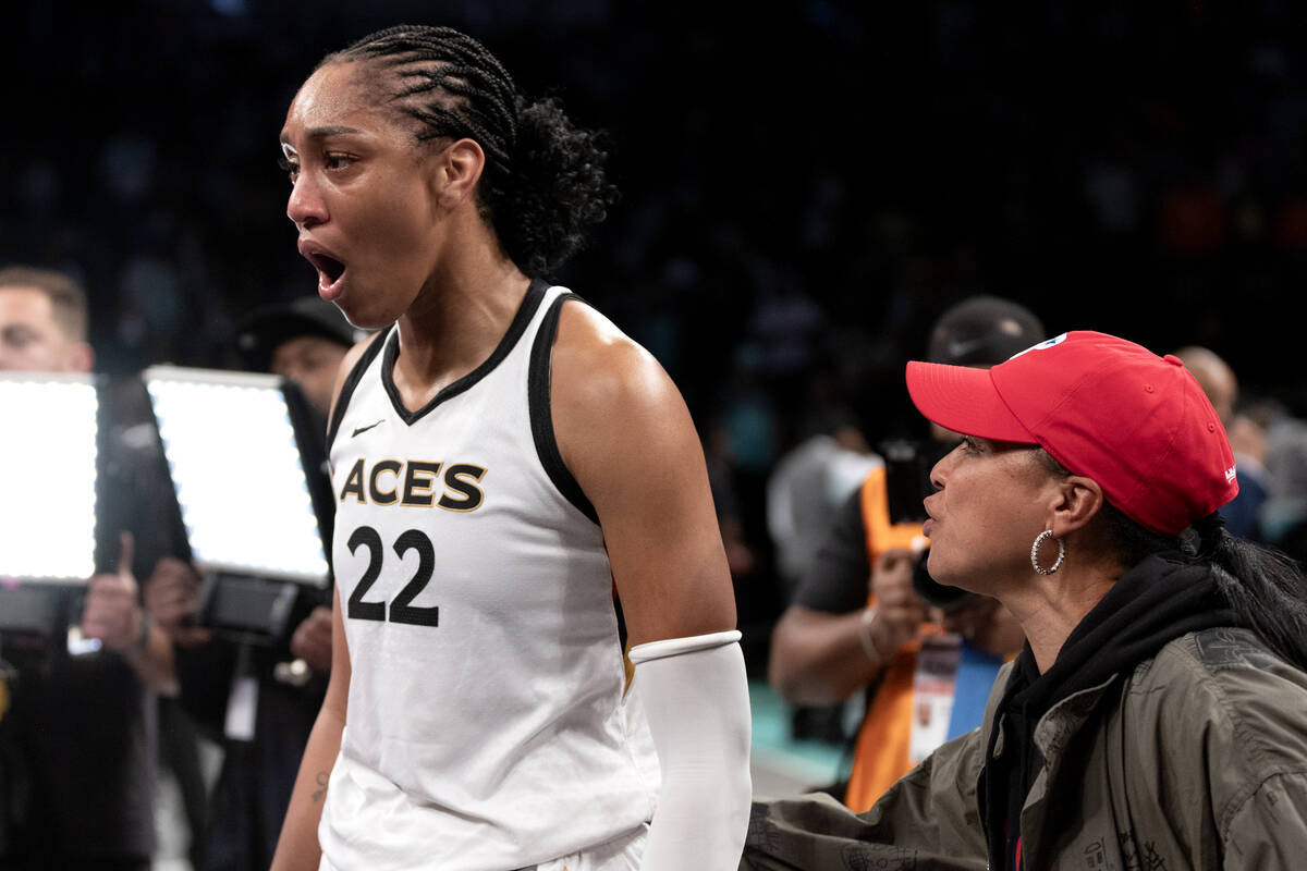 Las Vegas Aces forward A'ja Wilson (22) is congratulated by her former college coach Dawn Stale ...