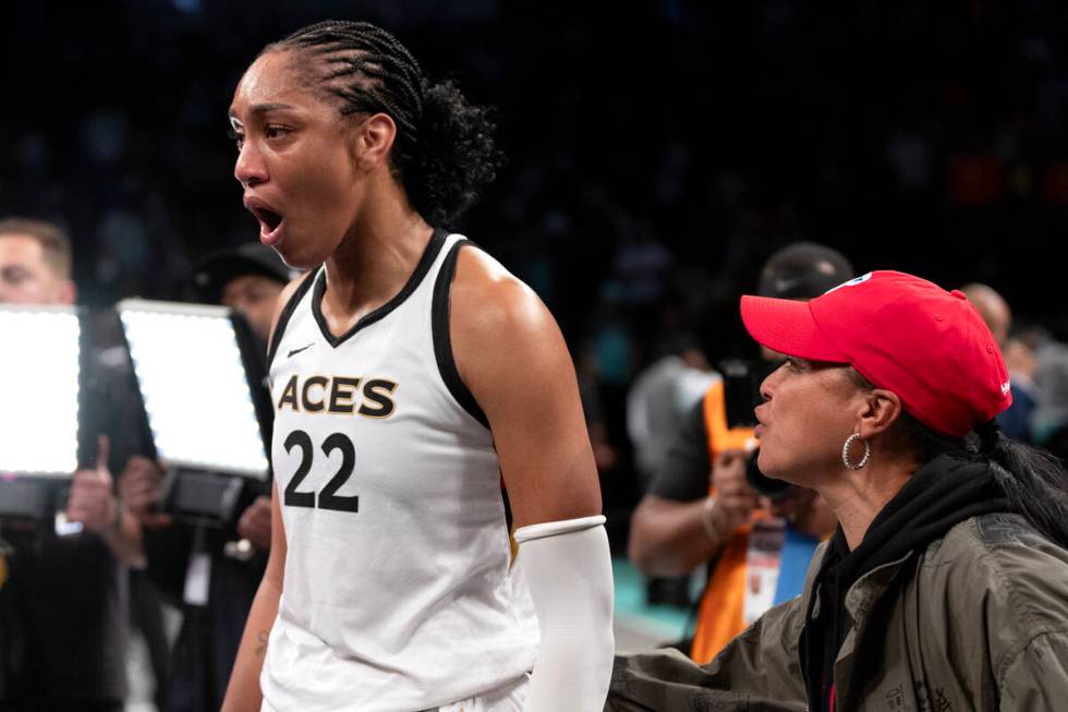 Las Vegas Aces forward A'ja Wilson (22) is congratulated by her former college coach Dawn Stale ...