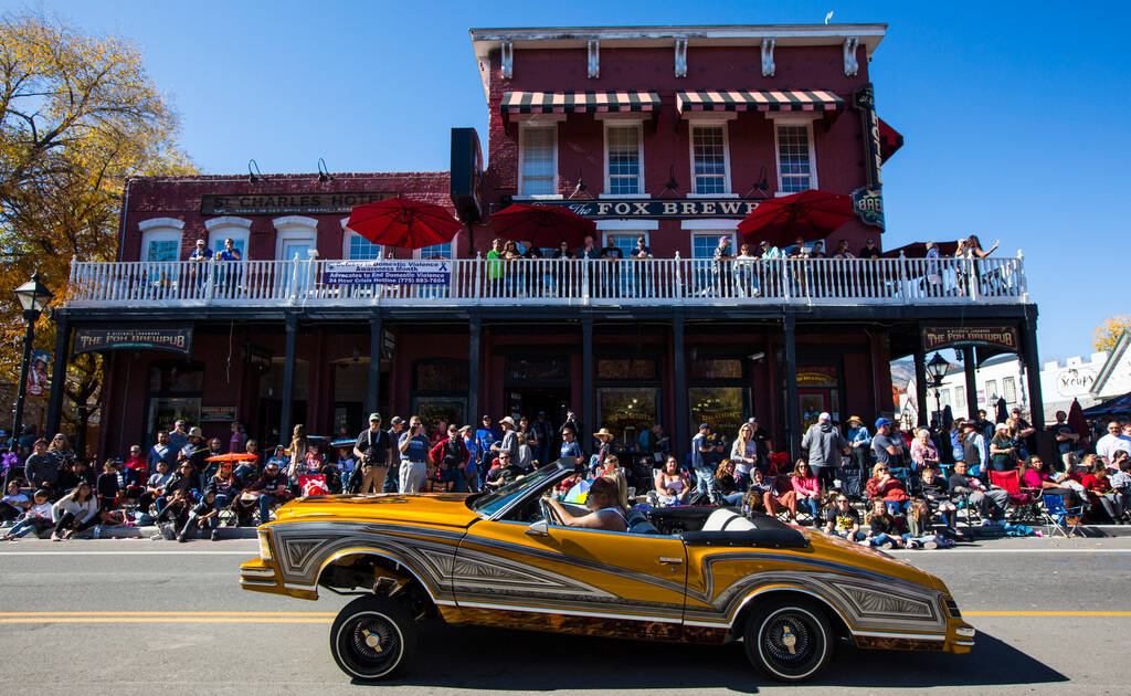 A member of the Uniques Car Club drives a lowrider during the annual Nevada Day Parade in Carso ...