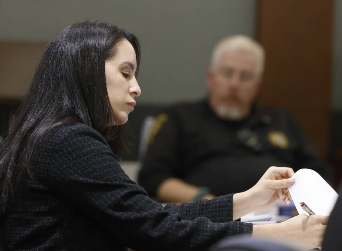 Arlene Heshmati, a public defender, takes notes as she attends a competency hearing at the Regi ...