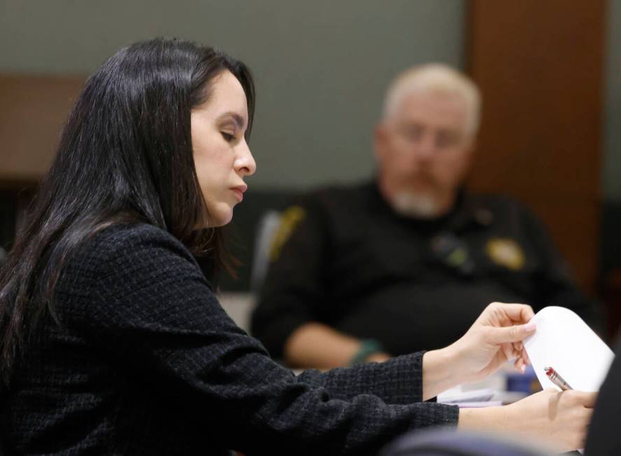 Arlene Heshmati, a public defender, takes notes as she attends a competency hearing at the Regi ...