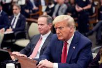 Former President Donald Trump sits in the courtroom with his legal team before the continuation ...