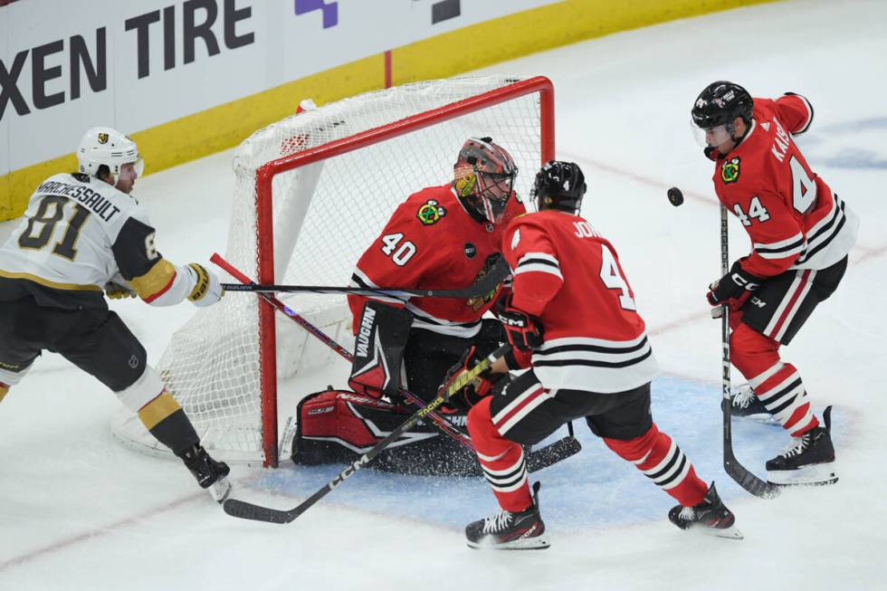 Chicago Blackhawks goalie Arvid Soderblom (40) makes a save against Vegas Golden Knights' Jonat ...