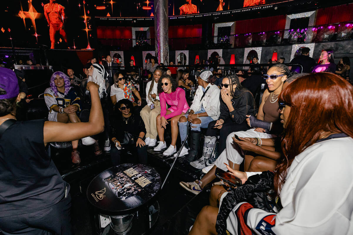 Members of the Las Vegas Aces are shown celebrating their second straight WNBA title at Drai's ...