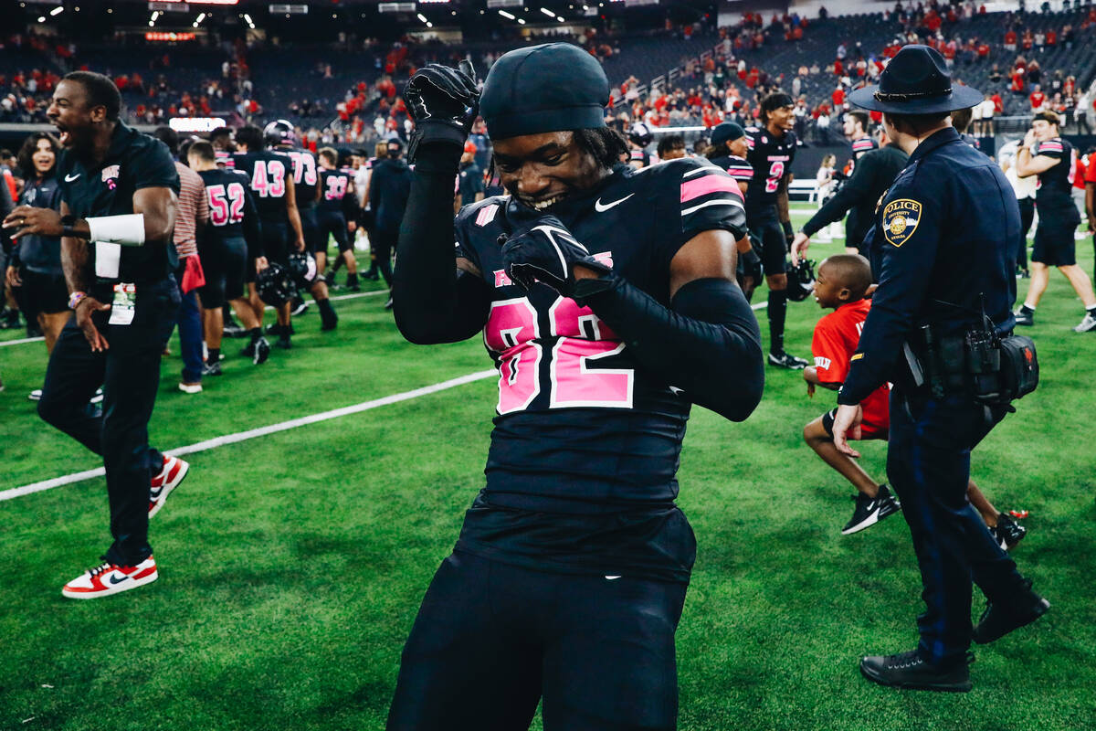 UNLV wide receiver Rashawn Jackson (82) celebrates after beating Colorado State and becoming bo ...