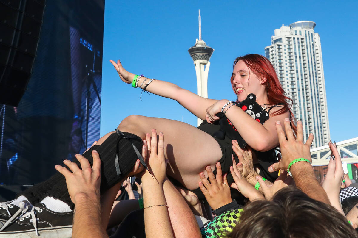 A Hot Mulligan fan crowd surfs at the When We Were Young 2023 music festival on Saturday, Oct. ...