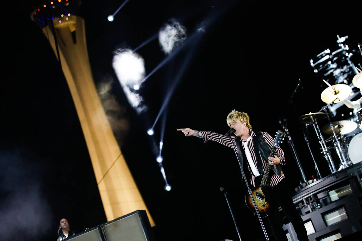 Green Day’s lead singer, Billie Joe Armstrong, points to the crowd as the Stratosphere l ...