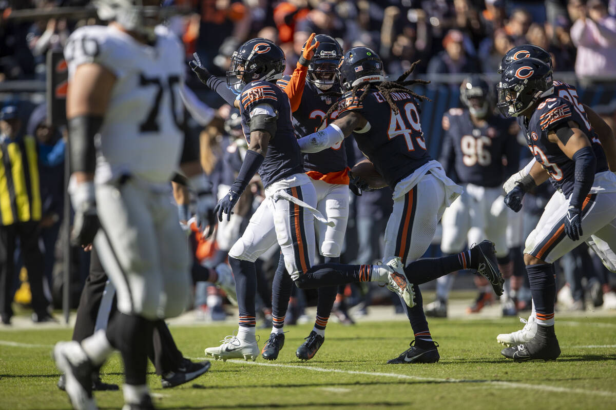 Chicago Bears linebacker Tremaine Edmunds (49) celebrates his interception of Raiders quarterba ...