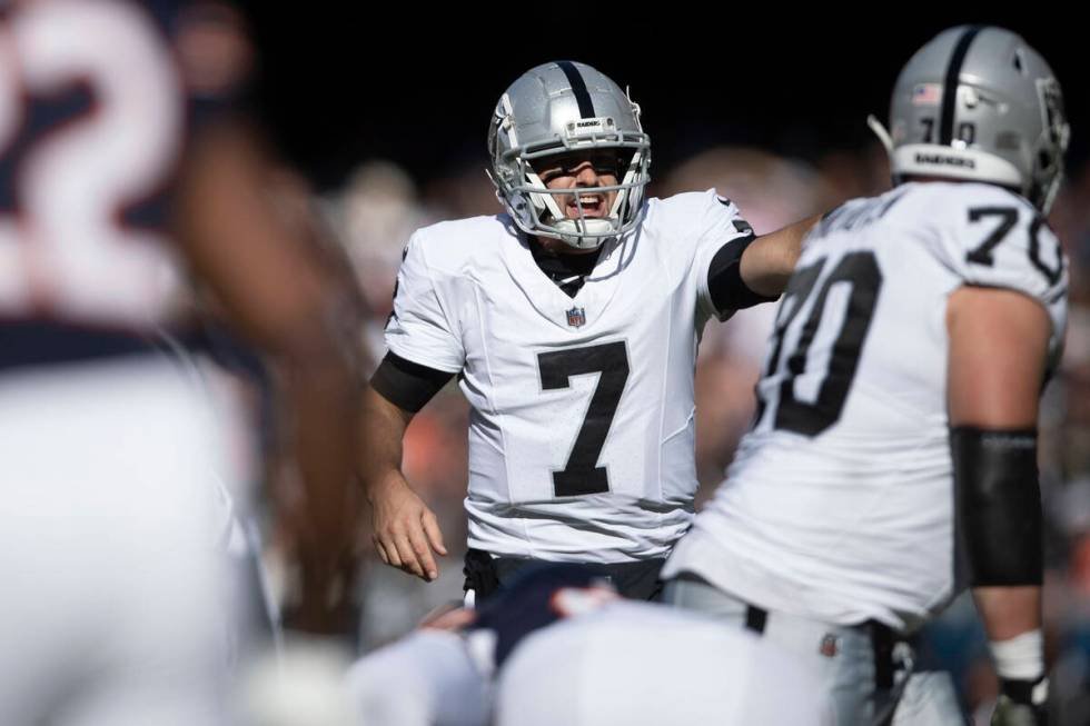 Raiders quarterback Brian Hoyer (7) audibles before a play during the second half an NFL game a ...