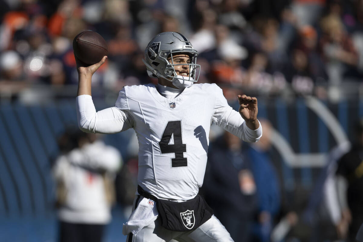 Raiders quarterback Aidan O'Connell (4) throws during the second half an NFL game against the C ...