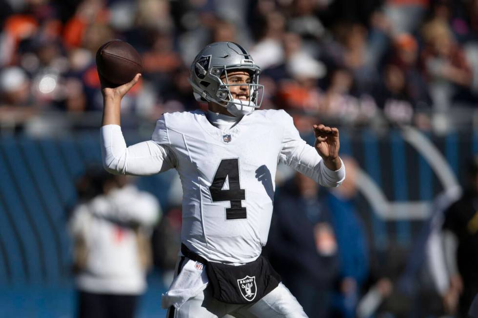 Raiders quarterback Aidan O'Connell (4) throws during the second half an NFL game against the C ...