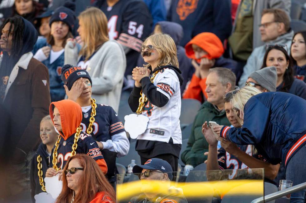 A young Chicago Bears fan watches as the team outscores the Raiders during the second half an N ...