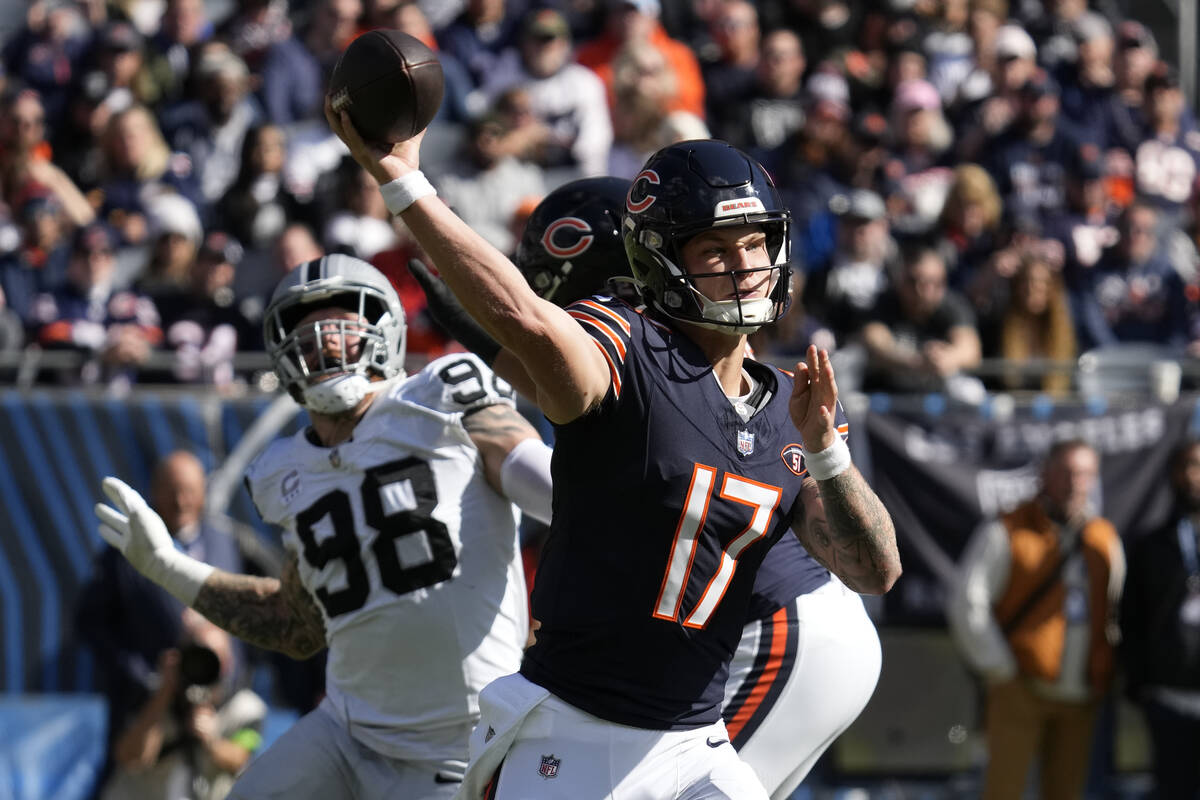 Chicago Bears quarterback Tyson Bagent (17) passes against the Las Vegas Raiders in the first h ...