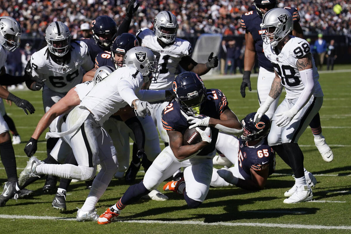 Chicago Bears running back D'Onta Foreman (21) scores his second touchdown of the game in the f ...