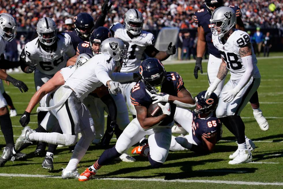 Chicago Bears running back D'Onta Foreman (21) scores his second touchdown of the game in the f ...