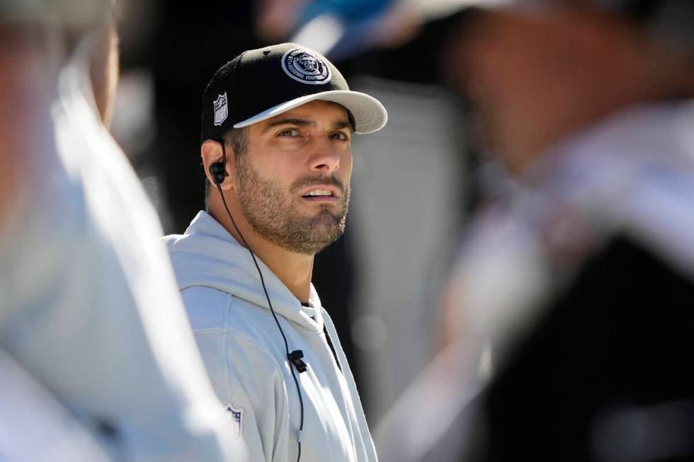 Las Vegas Raiders quarterback Jimmy Garoppolo watches from the sideline in the first half of an ...