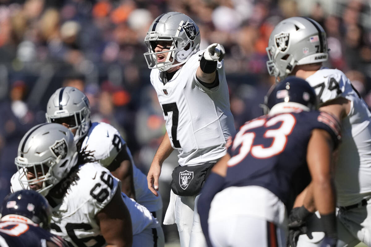 Las Vegas Raiders wide receiver Tre Tucker (11) cannot hold onto a pass as he is defended by Ch ...