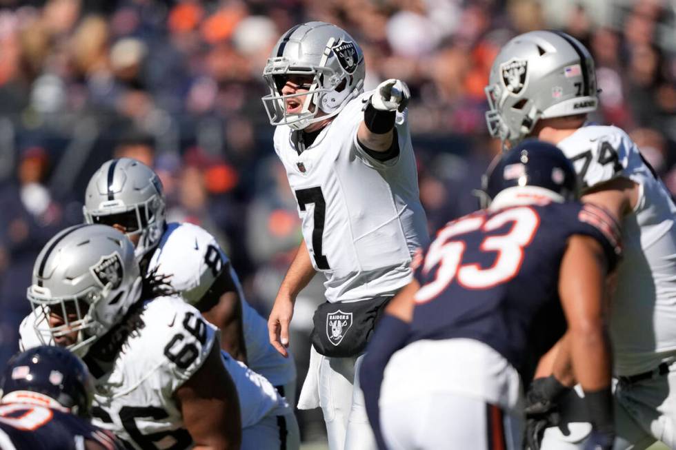 Las Vegas Raiders wide receiver Tre Tucker (11) cannot hold onto a pass as he is defended by Ch ...