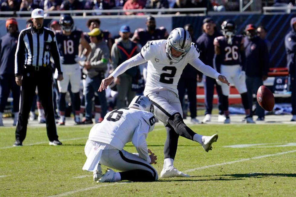 Las Vegas Raiders place kicker Daniel Carlson (2) kicks a 40-yard field goal in the first half ...