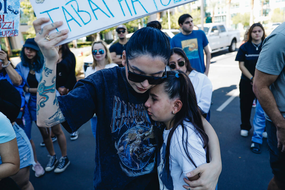 Alicia Lozoya, left, holds onto Macy Diaz, 8, as they get emotional during a demonstration in m ...