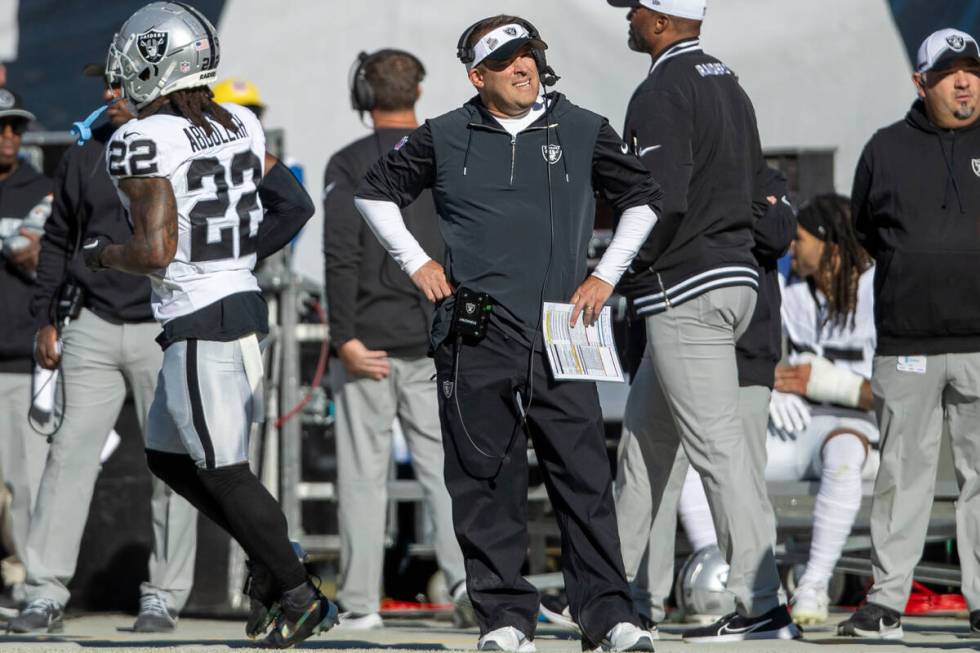 Raiders head coach Josh McDaniels looks to the replay screen after the team fails to convert a ...