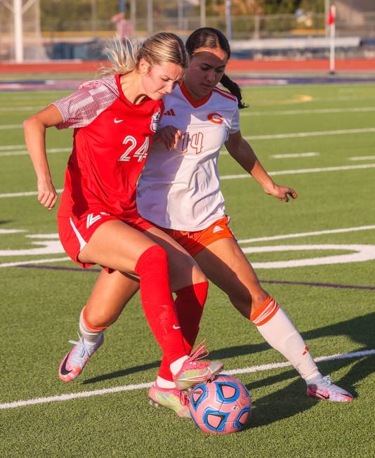 Coronado’s Aubrey Wagner (24) and Bishop Gorman’s Jaelah Licea-Greene (14) fight ...