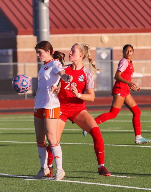 Bishop Gorman’s Hunter Borgel (24) takes control of the ball while Coronado’s Cat ...