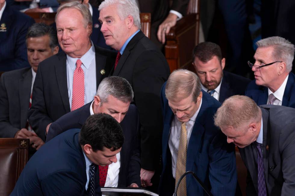 FILE - Rep. David Joyce, R-Ohio, upper left, confers with House Majority Whip Tom Emmer, R-Minn ...