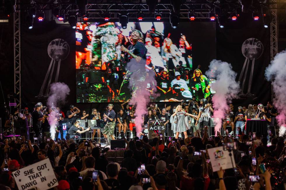 Aces players dance on stage during their championship celebration at Toshiba Plaza at T-Mobile ...