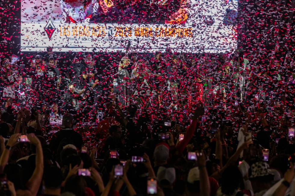 Confetti rains down on the Aces during their championship celebration at Toshiba Plaza at T-Mob ...