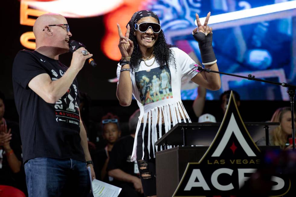 Las Vegas Aces forward A'ja Wilson takes the podium to speak during a celebration of her team&# ...