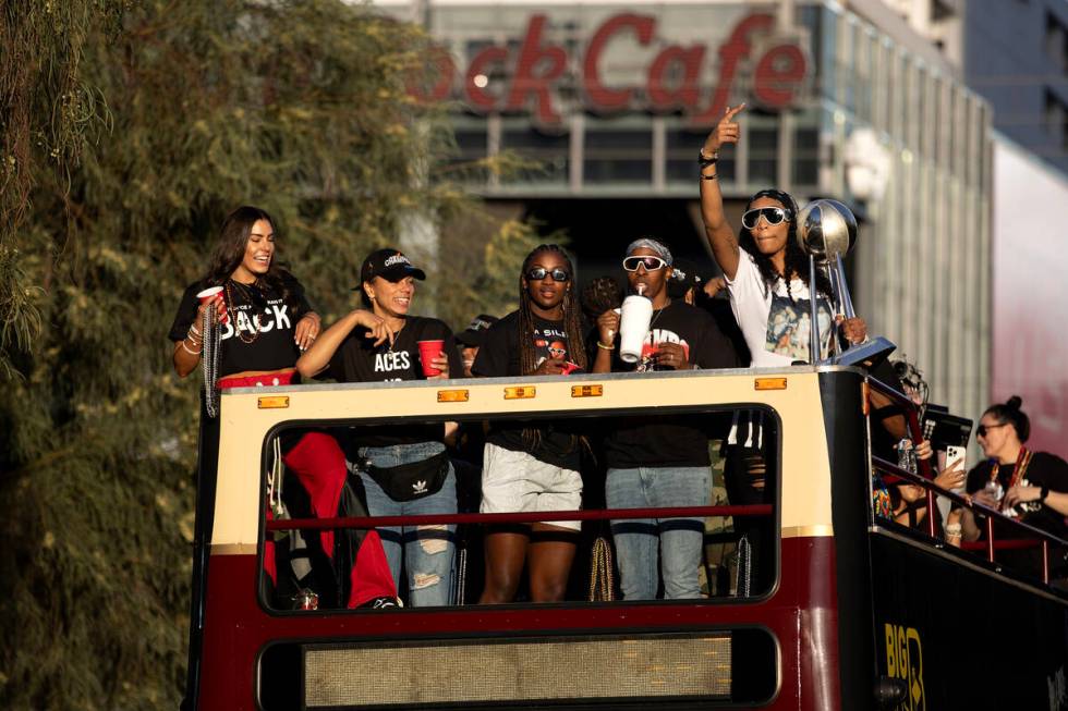 The Las Vegas Aces celebrate their WNBA basketball championship win with a parade down Las Vega ...