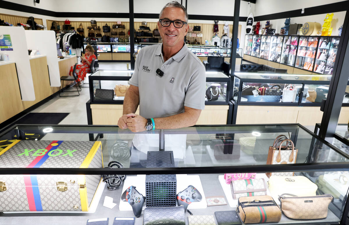 Owner Michael Mack poses for a photo at his Max Pawn Luxury location on South Decatur Boulevard ...