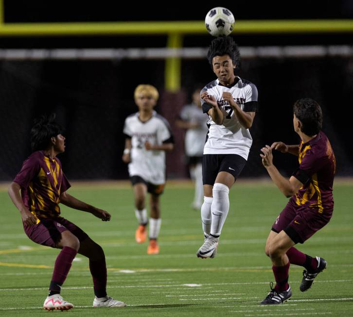 Las Vegas’ Sebastian Fronda (7) gains a header over Eldorado during the first half of a ...