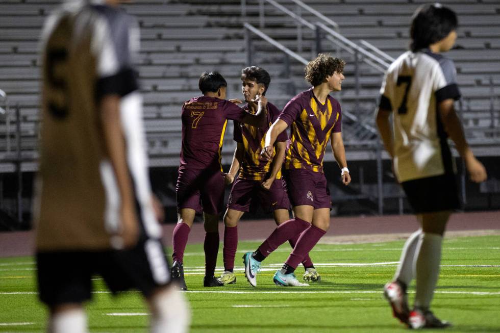 Eldorado celebrates a goal by their Henyor Archila (7) during the second half of a boys high sc ...