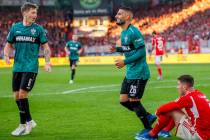 Deniz Undav of VfB Stuttgart celebrates scoring his side's third goal during the Bundesliga so ...