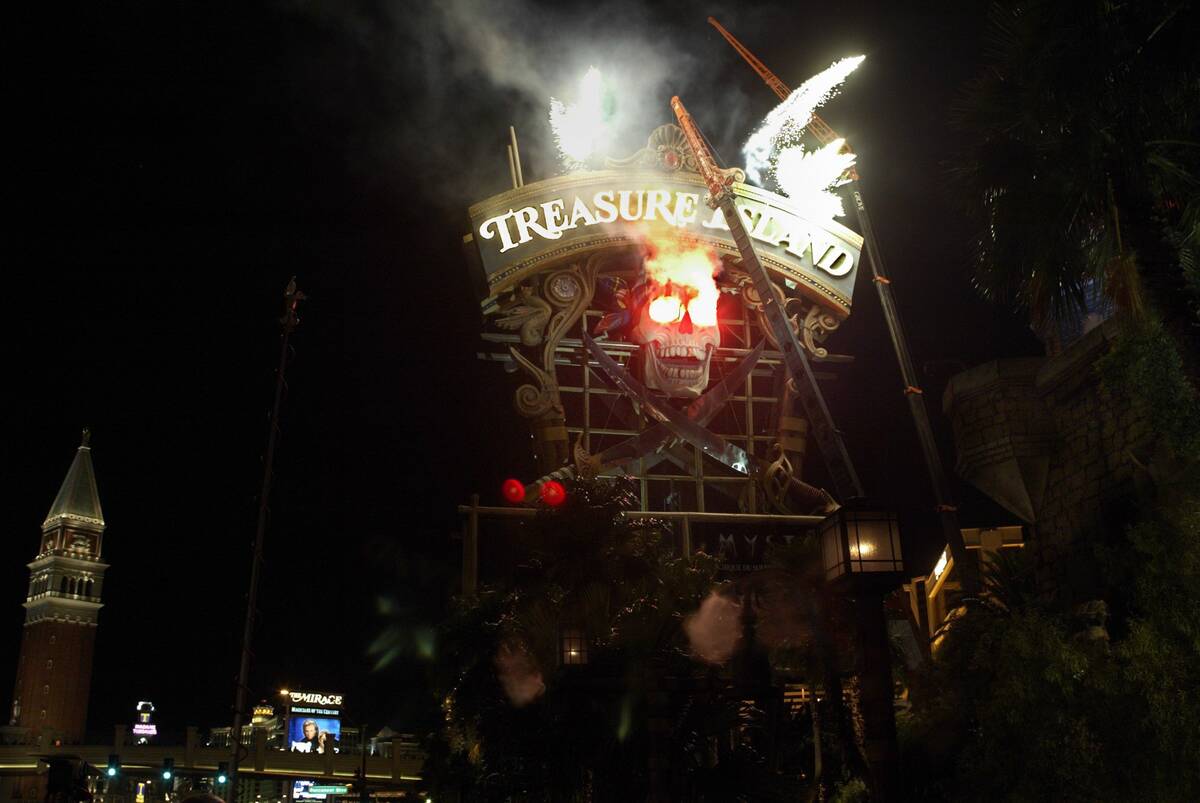 Fireworks explode as the skull is removed from the Treasure Island marquee Thursday, July 10, 2 ...