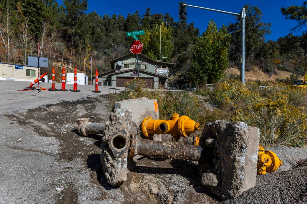 Old fire hydrants are piled in Old Town as repairs continue at Mount Charleston from Tropical S ...