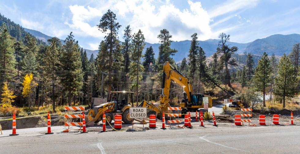 A main road into the Rainbow Canyon subdivision is still damaged and closed as repairs continue ...