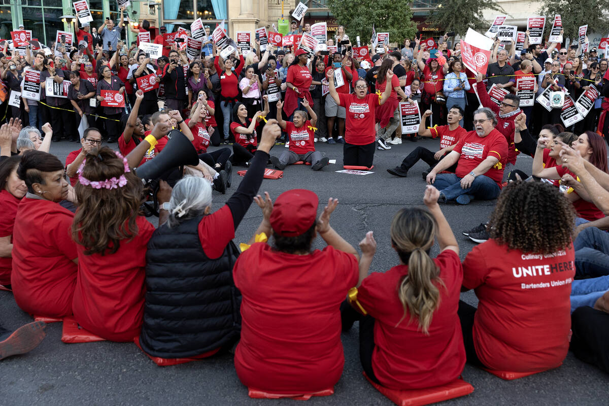 Culinary union members block Las Vegas Boulevard during a rally with thousands of fellow hotel ...