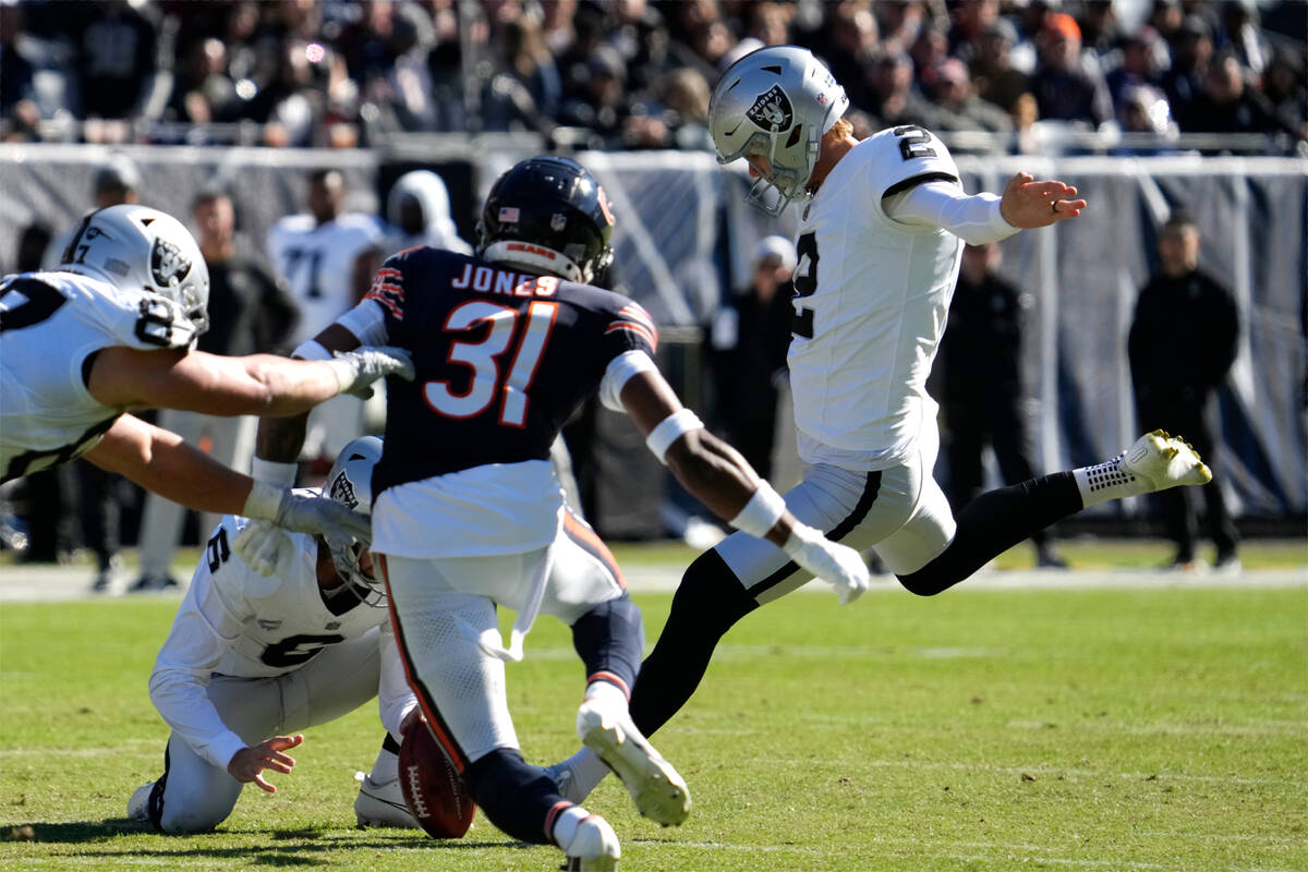 Las Vegas Raiders place kicker Daniel Carlson (2) kicks a 40-yard field goal against the Chicag ...