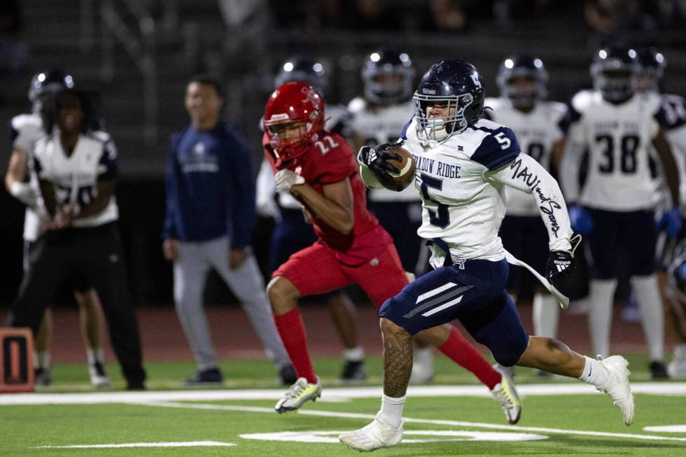 Shadow Ridge running back Keau Hadley Jr. runs the ball for a significant gain against Arbor Vi ...