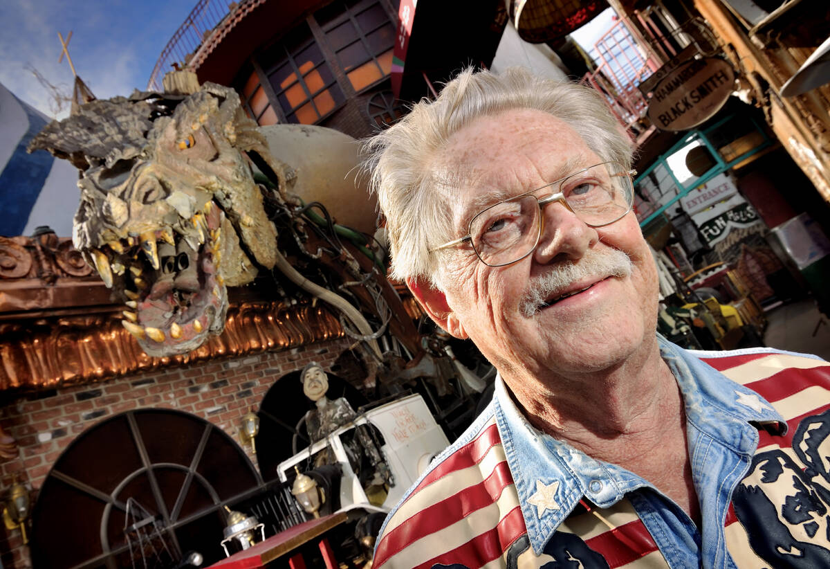 Dr. Lonnie Hammargren stands in his back yard with some of his treasures. (Las Vegas Review-Jou ...