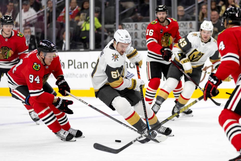 Golden Knights right wing Mark Stone (61) skates with the puck against Blackhawks right wing Co ...