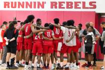 UNLV's basketball players gathered to listen to their coach Kevin Kruger after team practice, o ...
