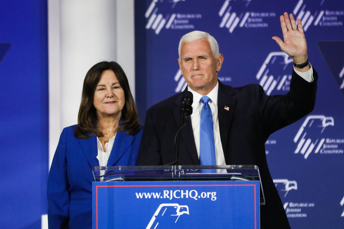 Former Vice President Mike Pence announces the end of his presidential campaign, alongside his ...