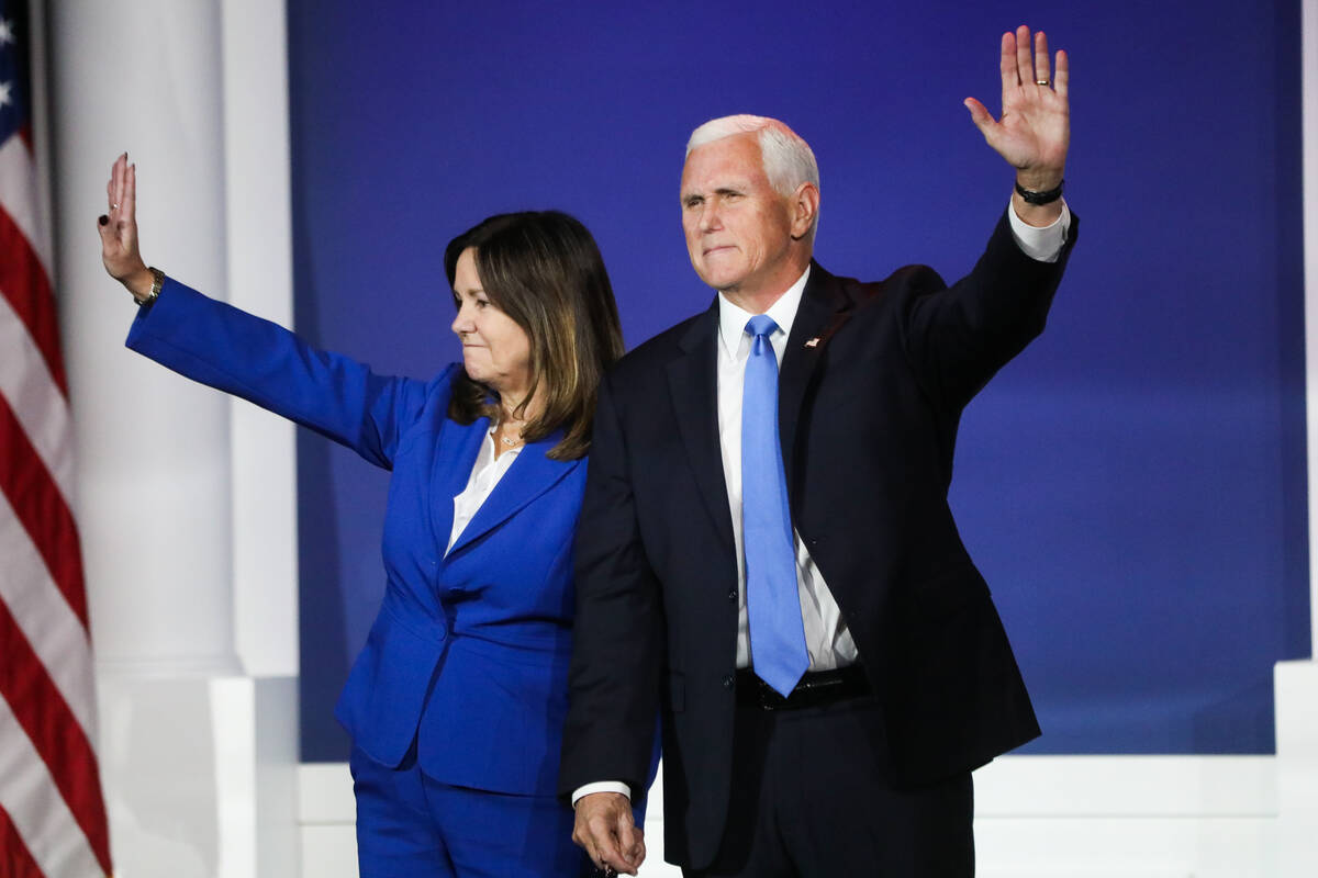 Former Vice President Mike Pence announces the end of his presidential campaign, alongside his ...